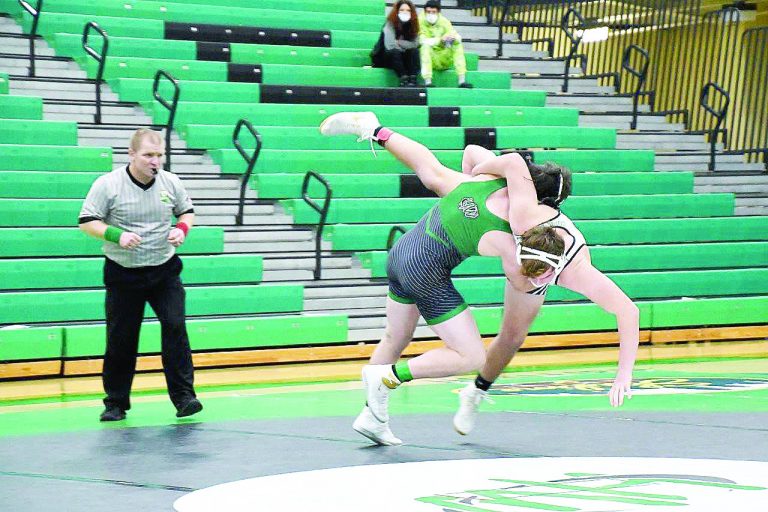 Wildcat wrestler Dominic Little takes his opponent to the mat for a pin in 12 seconds against Mason Jan. 14. Little has won 14 of his 15 matches, 12 by pin. Photo by Sandy Minor