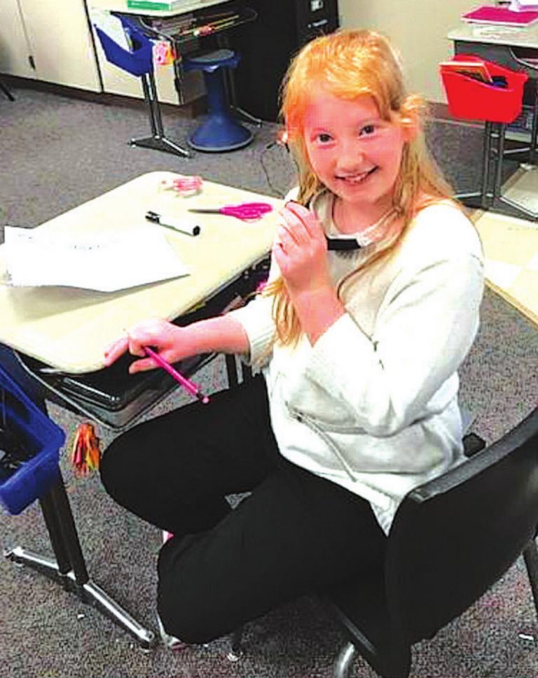 A fourth-grade student from Bright Elementary School uses a STEAM activity set. SUBMITTED PHOTO
