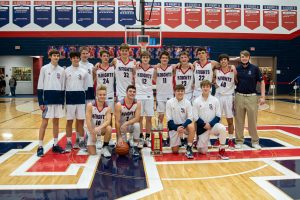 South Dearborn’s Knights (6-3) won their first River Town Classic championship in 8 years with Saturday night’s 49-32 victory over Rising Sun,  led by tournament MVP Eli Hoffman (11), who scored a game-high 18 points in the final. Photo by BETTY TAYLOR/TaylorMadePhotography