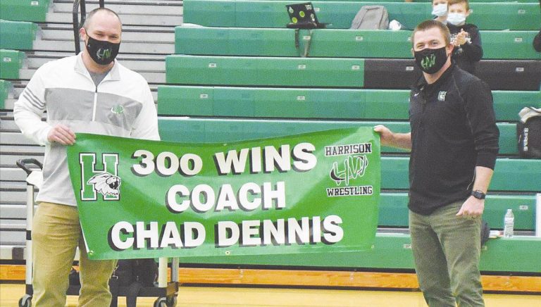 Harrison Wrestling coach Chad Dennis, left, posted his 300th win in a Jan. 28 tri-match against Oak Hills and Springboro. With Dennis is assistant coach Eric Meyer. PHOTO BY SANDY MINOR