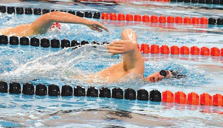 Harrison senior C.J. Wesseler, in action earlier this season, won the 500-yard freestyle at the Southwest Ohio Conference meet Jan. 30 at Miami University. PHOTO BY SANDY MINOR