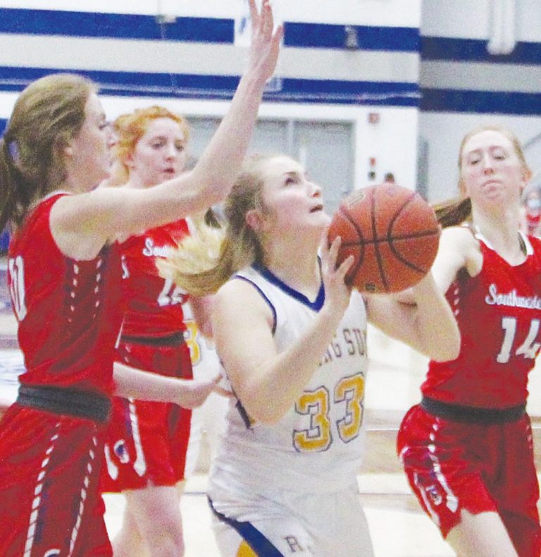 MASON J. UHLMANSIEK Freshman forward Alyssa Simpson (33) led all scorers with 20 points and doubled up with 13 rebounds in Rising Sun’s 61-49 Class A sectional second round win over Hauser Wednesday, Feb. 3, at Waldron.