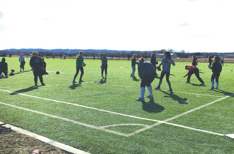 Harrison’s softball team works out on the artificial turf practice field at the school March 1. PHOTO BY DICK MALONEY