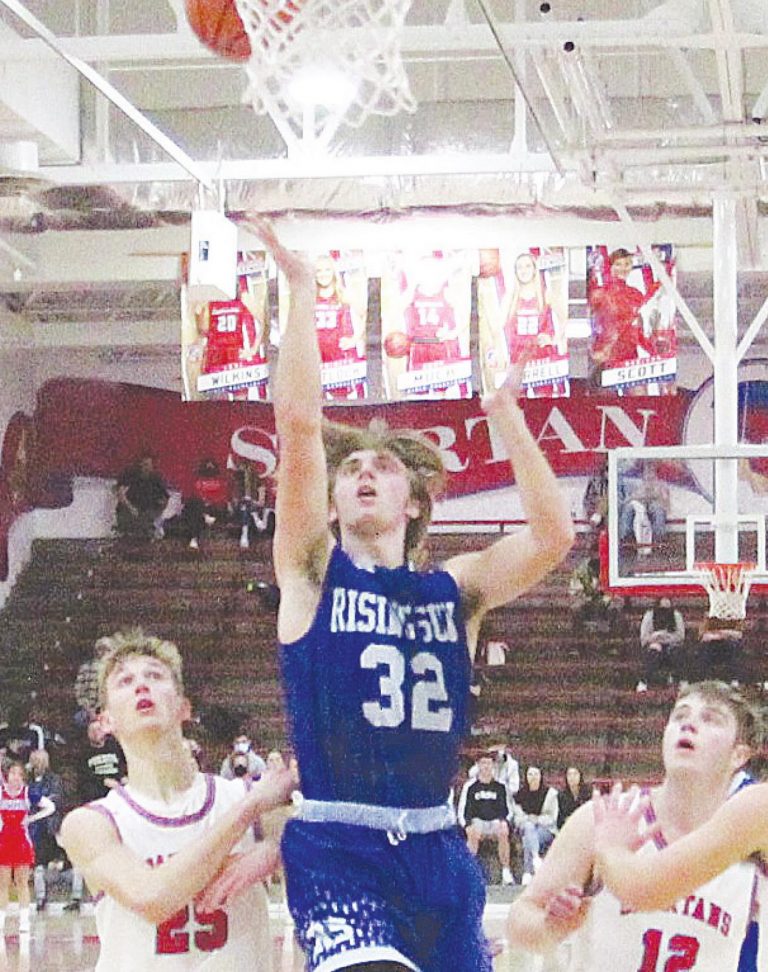 Rising Sun senior guard Landon Cole (32) totaled 41 points in two sectional games last week to lead the basketball Shiners, who posted their first state tournament win since a 2015 run to the Class A title game. MASON J. UHLMANSIEK