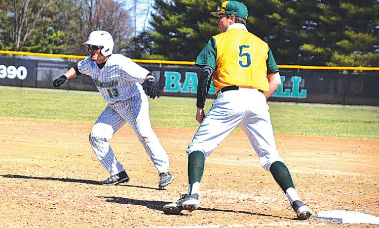 Harrison Wildcat Joe Garza leads off first base during the first scrimmage by the baseball team March 20. PHOTO BY SANDY MINOR