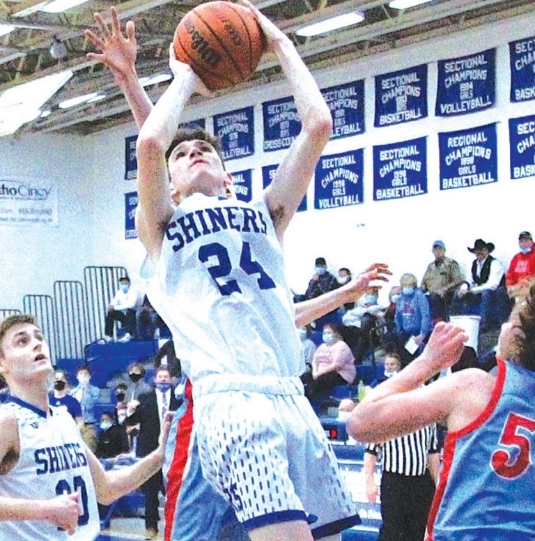 One of three Shiners to crack double figures, junior forward Damon Carrigan (24) scored 11 points in Rising Sun’s 79-31 regular season-ending home court win over Medora Friday night, Feb. 26. MASON J. UHLMANSIEK