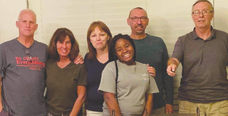 John, Carmen, and Bella Niehaus host Karen Lovern, Kevin Fancher and Tim Hillman at their home in Haiti. Carmen is the principal at Sonlight and her and John adopted Bella. SUBMITTED PHOTO