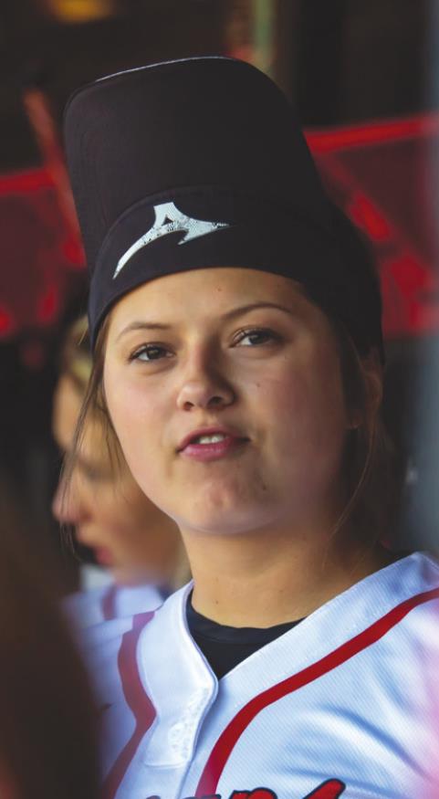 East Central senior Jessi Kincer sports her “rally cap” during the Lady Trojans’ 9-run fourth inning, which brought EC (10-3, 4-0 EIAC) back from a 2-0 deficit for Thursday’s 16-6, 6-inning win over South Dearborn. SANDY MAHONEY