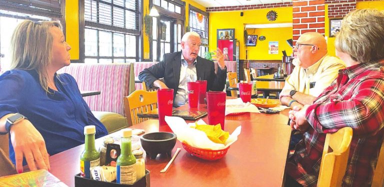 U.S. Congressman Mike Pence, second from left, talked with Rising Sun residents and business owners April 9 at Tequila’s in downtown. SUBMITTED PHOTO