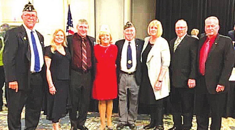 Jim Dole was awarded Ohio Legionnaire of the Year by the American Legion Department of Ohio. From left Past Department of Ohio Commander and member of Post 199 Jerry Wilson, Linda Dole, Doug Dole, Department of Ohio 1st Vice Commander Jean Wilson, Jim Dole, Annie Milesky, Mike Dole and Mark Dole. SUBMITTED PHOTO
