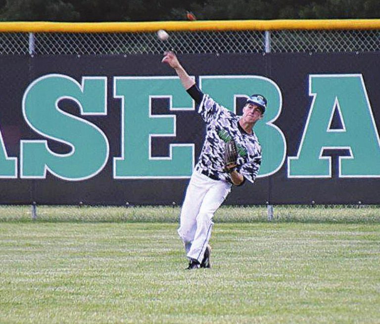 Harrison outfielder Carter Daniel throws the ball back into the infield during the Wildcats game against Elder during the Military Appreciation Night at Harrison May 8. PHOTO BY SANDY MINOR