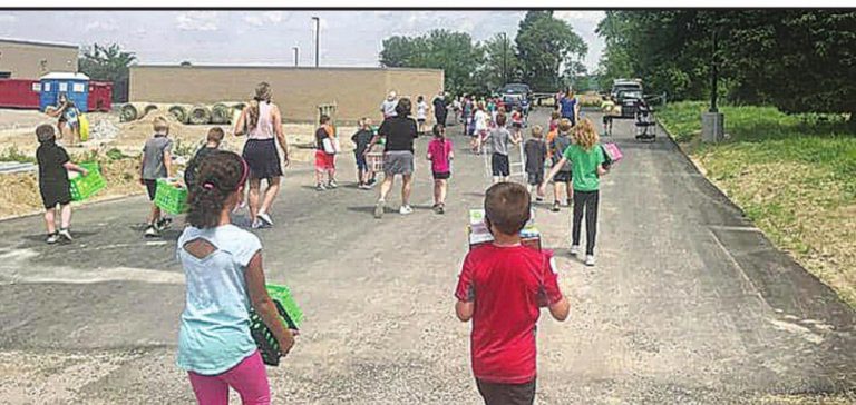 Students at Crosby Elementary helped their teachers move some things to the new building last week. PHOTO FROM CROSBY ELEMENTARY SCHOOL FACEBOOK