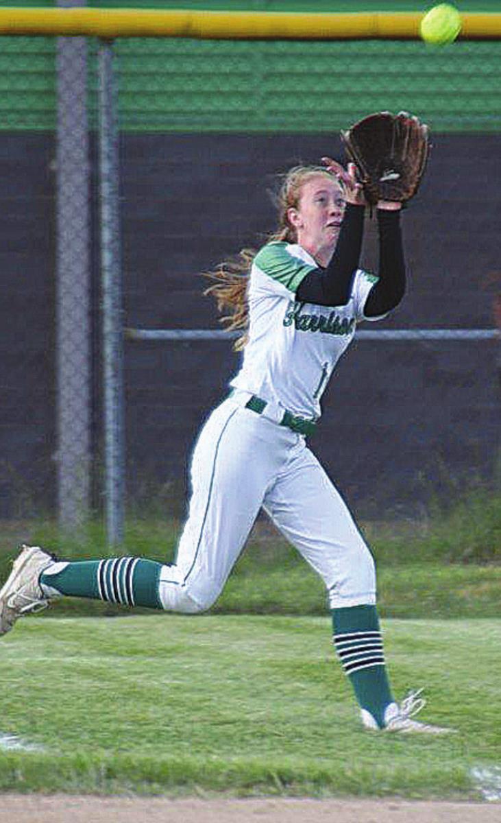Wildcat Cassie Schultheis makes a running catch in the outfield during Harrison’s game against Kings May 12. PHOTO BY SANDY MINOR