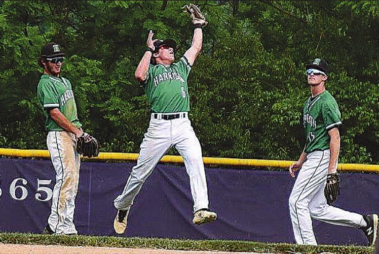 Harrison second baseman Nathan Blank leaps to snare a ball during the Wildcats Division I sectional final game against Mason May 25. The loss eliminated Harrison from the post-season tournament. PHOTO BY SANDY MINOR