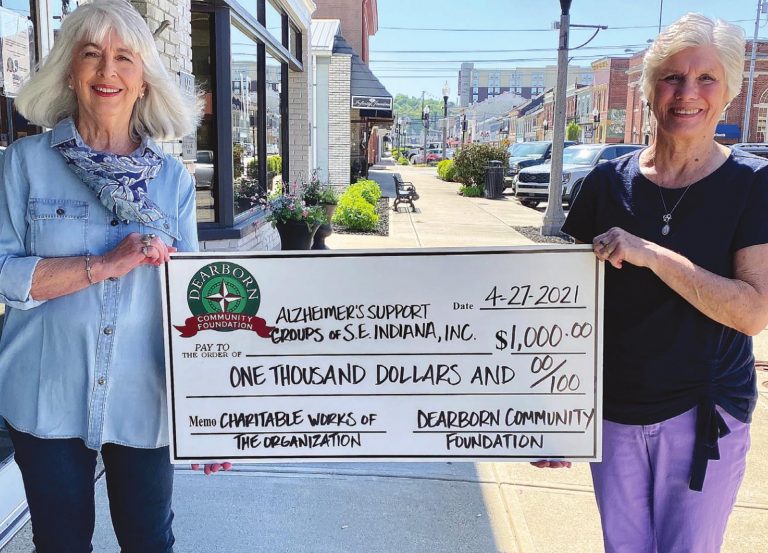 Dearborn Community Foundation Board member Fayla Nanz, left, delivers a $1,000 grant check to Alzheimer’s Support Groups of Southeast Indiana’s President Sue Manford. SUBMITTED PHOTO