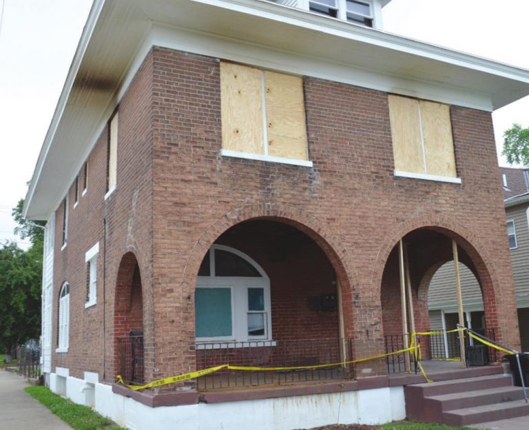 The house at Williams and Elm streets in Lawrenceburg where Sandy Flach lived was wrecked by fire, where her dog and cat died. The community is coming together to help. HALIE BARGER/THE JOURNAL-PRESS