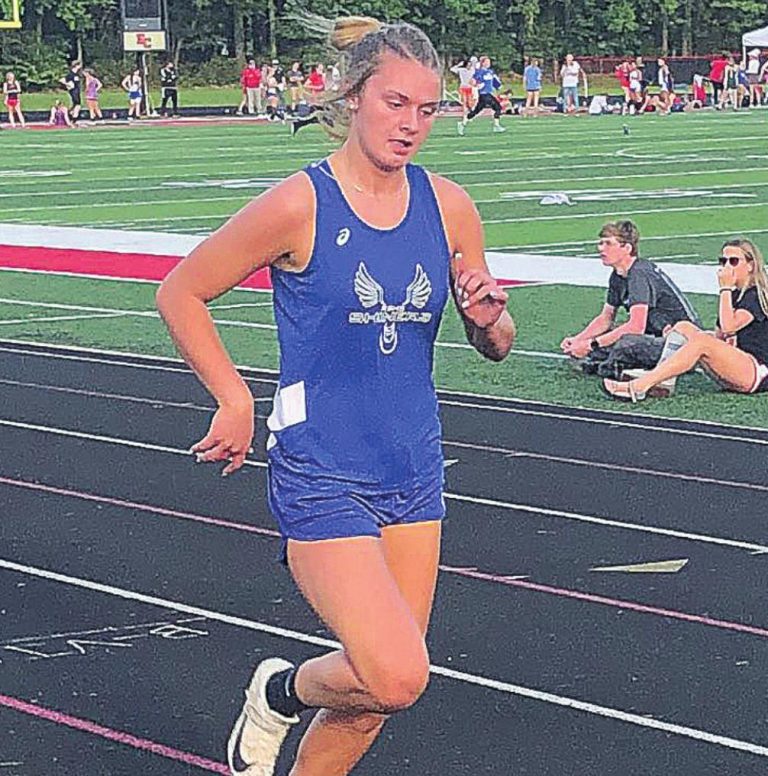 Rising Sun junior Halle Shorten crosses the finish line with the 400-meter dash title, in a time of 1:03.20, in last week’s IHSAA girls track and field sectional at East Central High School. MASON J. UHLMANSIEK
