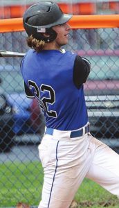 Landon Cole watches as his 3-run home run clears the fence in Friday’s 12-7 win at Switzerland County. MASON J. UHLMANSIEK