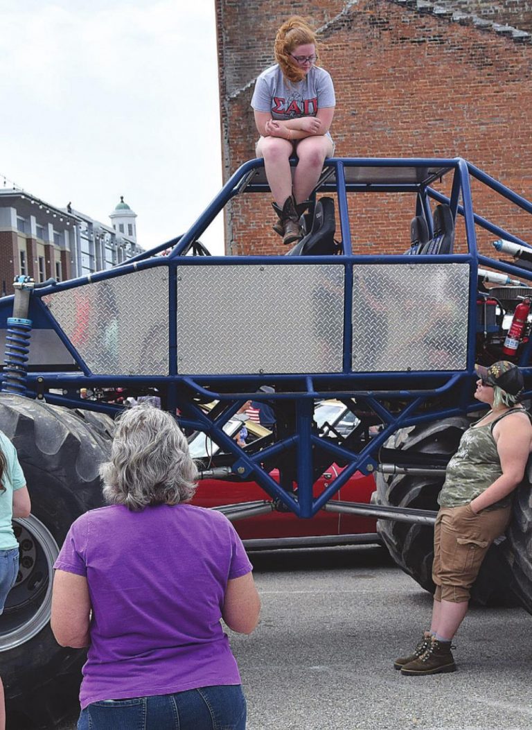 A visitor to the Cruisin’ for a Cure for ALS Car Show had a unique vantage point during the show along High Street Sunday. A record 927 cars were parked along Lawrenceburg streets. MARC EMRAL/The Register