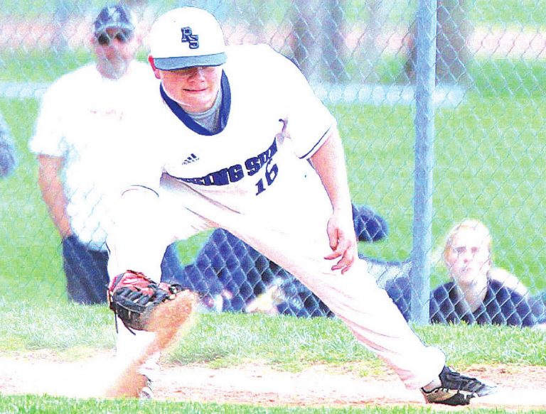 Sophomore first baseman Payton Creech (16) digs a throw out of the dirt for the put out in action for Rising Sun varsity baseball earlier this season in the Shiners’ win over No. 1-ranked Oldenburg Academy Friday, April 9. MASON J. UHLMANSIEK