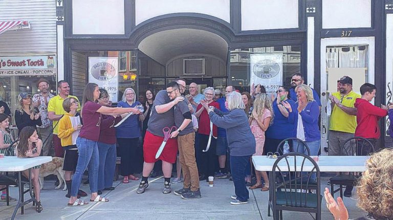 The ribbon cutting at the new coffee shop, Uncle Steel’s Brews, on Second Street in Aurora. SUBMITTED PHOTO