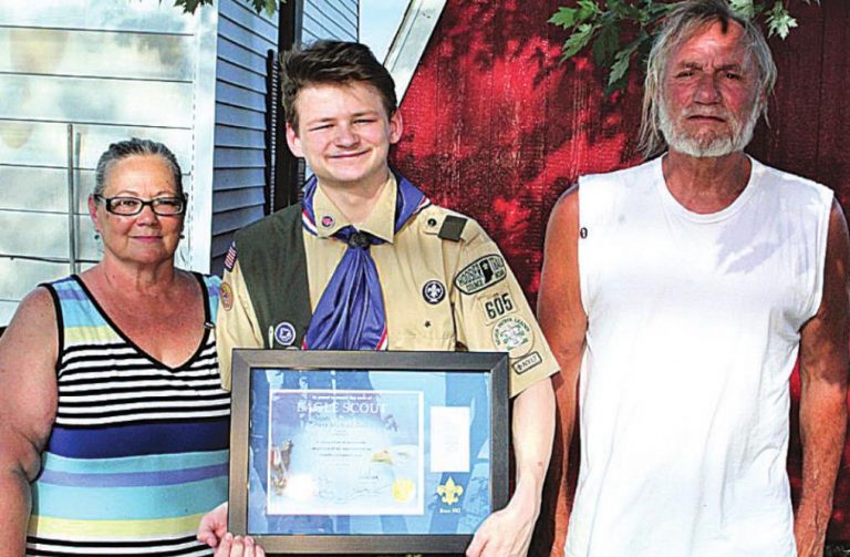 New Eagle Scout Robert Michael Bailey, with his parents, Debbie Hayes Cole and James Cole. SUBMITTED PHOTO