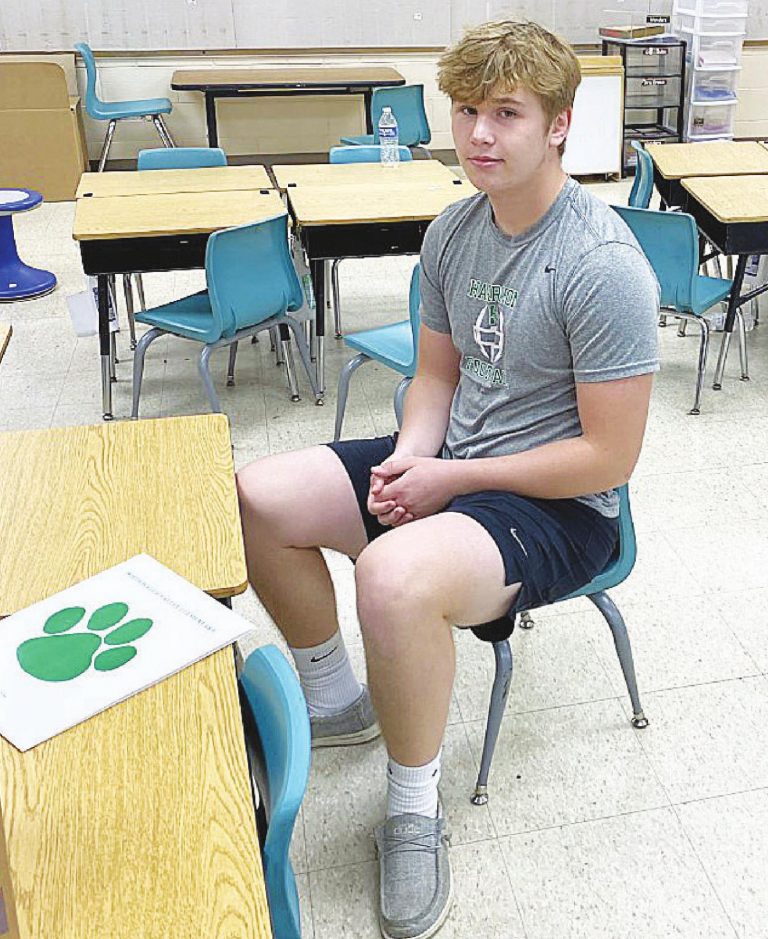 Aydan Mackendrick couldn’t believe how small the desks were at Whitewater Valley Elementary’s farewell tour. SUBMITTED PHOTO