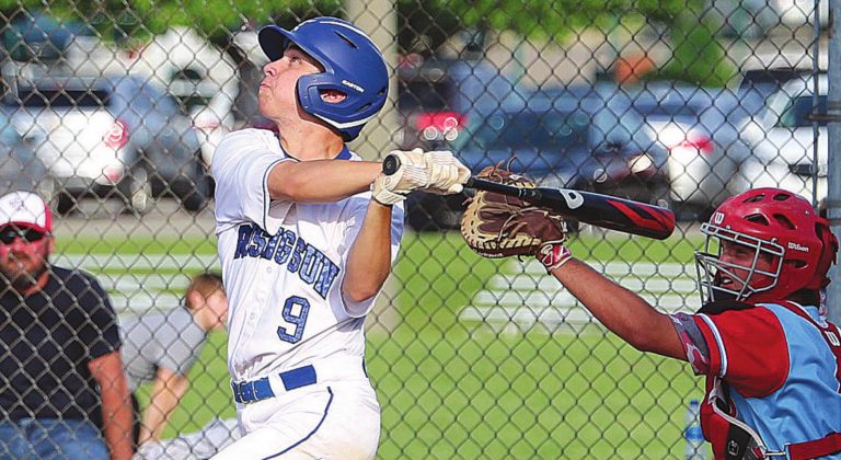 Rising Sun junior Ashton McCarty (9) watches the flight of a ball hit to right field in the Shiners’ 3-2 ORVC home victory over Jac-Cen-Del May 19. He had 2 hits and knocked in a run in Monday’s Class A sectional games. MASON J. UHLMANSIEK