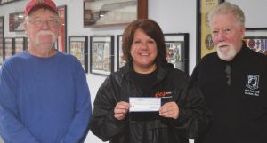 The VFW in Harrison donated $1,000 to the YES Home in Dearborn County. Presenting the check are, from left VFW Second Commander Bill Floyd, YES Home Executive Director Amy Phillips, and VFW Post 7570 Commander Mike Whitener. HALIE BARGER/THE HARRISON-PRESS