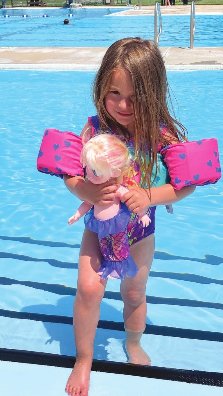 Paeton Chase and Elsa enjoy a dip at the Rising Sun Community Pool. BETH TERRILL/THE RECORDER & NEWS