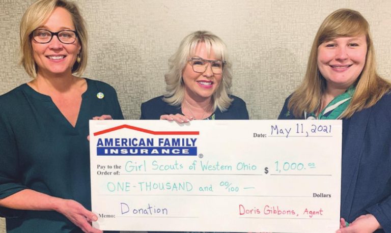 Doris Gibbons, owner of Gibbons Insurance Agency, center, receives the Community Impact Award from Girl Scout Director of Development Lynn Migliara, right, and Girl Scout Community Development Manager Kristen Woods. SUBMITTED PHOTO