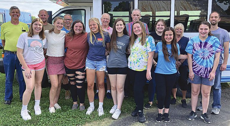 Volunteers who helped place flags in three cemeteries in the Rising Sun are were, back row from left, Mike O’Neal, Mayor Steve Slack, Eldon Fancher, Russ Robinson, Lloyd Pavy, Kara Colen, Cheri Collins, Jarron Bovard; front row, Kassidy Lewis, Hannah Kremer, Tamryn Miller, Hillary Lambert, Olivia Cate, Makenzie Ware, Maria Manologlou, Kaitlyn Henry. Not pictured were Brenda O’Neal, Barbara Fitch and Ron Spurlock. PHOTO BY ROB SPURLOCK