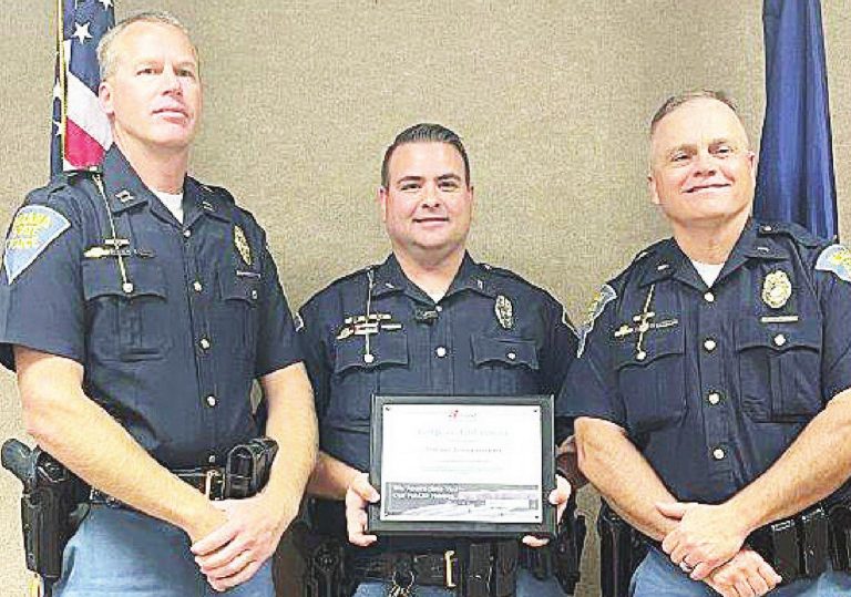 Capt. Anthony Scott, from left, Trooper Jayme Herbert, Lt. Paul Adams as Herbert re- SUBMITTED PHOTO