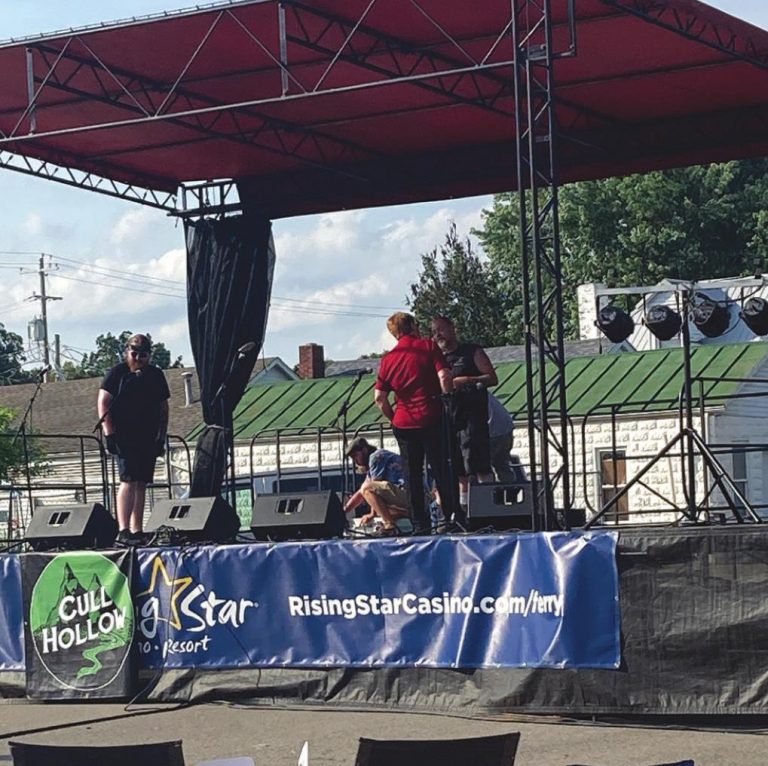 The Cull Hollow Band begins to warm up for the first performance with the Summer Sounds of Main concert on Main Street in Rising Sun. BETH TERRILL/THE RECORDER AND NEWS