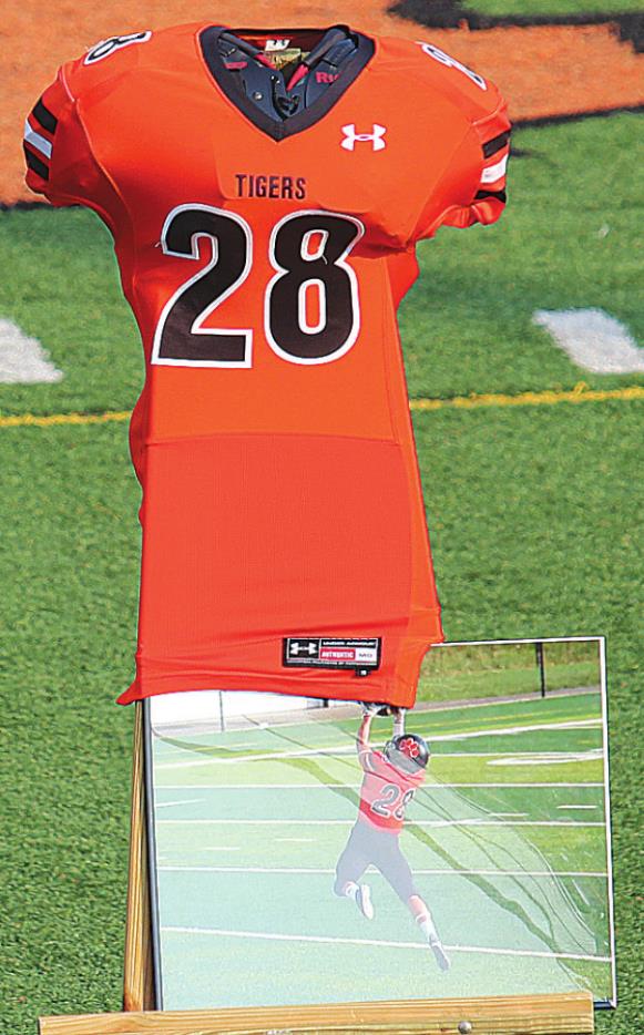 Friends, family, and fellow football players attended a memorial prayer service for LHS student Brady Gabbard. MATT POPOVICH/THE REGISTER