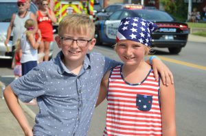 Anderson, 11 and Ashton Henke, 7, enjoyed trying to catch the candy thrown from the parade in downtown Harrison on Sunday.