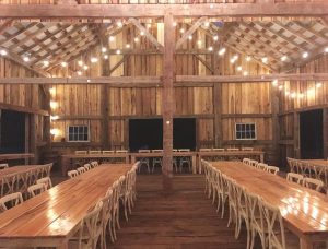 The inside of the barn where weddings and other events are held can hold up to 184 people. The tables were handcarved by Casey Knigga. SUBMITTED PHOTO