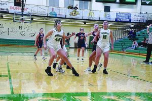 Sandy Minor Wildcats Alli Robertson, right, and Krissy Kowalski get position underneath the basket for a rebound the Harrison’s 51-29 victory over Norwood in the season opening game Nov. 20.