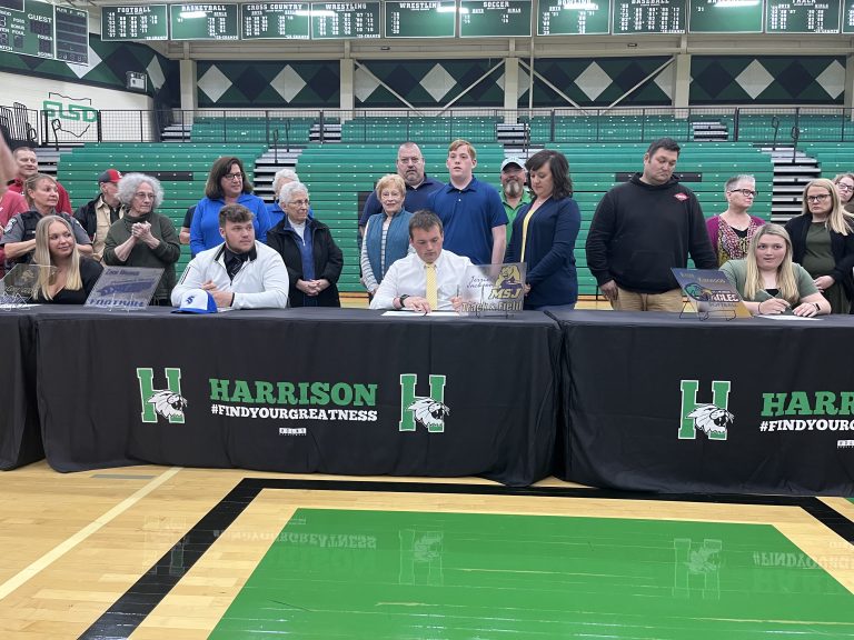 Harrison signs