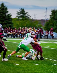 Wildcat Cohen Hering moves in to make a tackle in Harrison’s victory over Western Hills Friday night. Photo by Noah Doyle